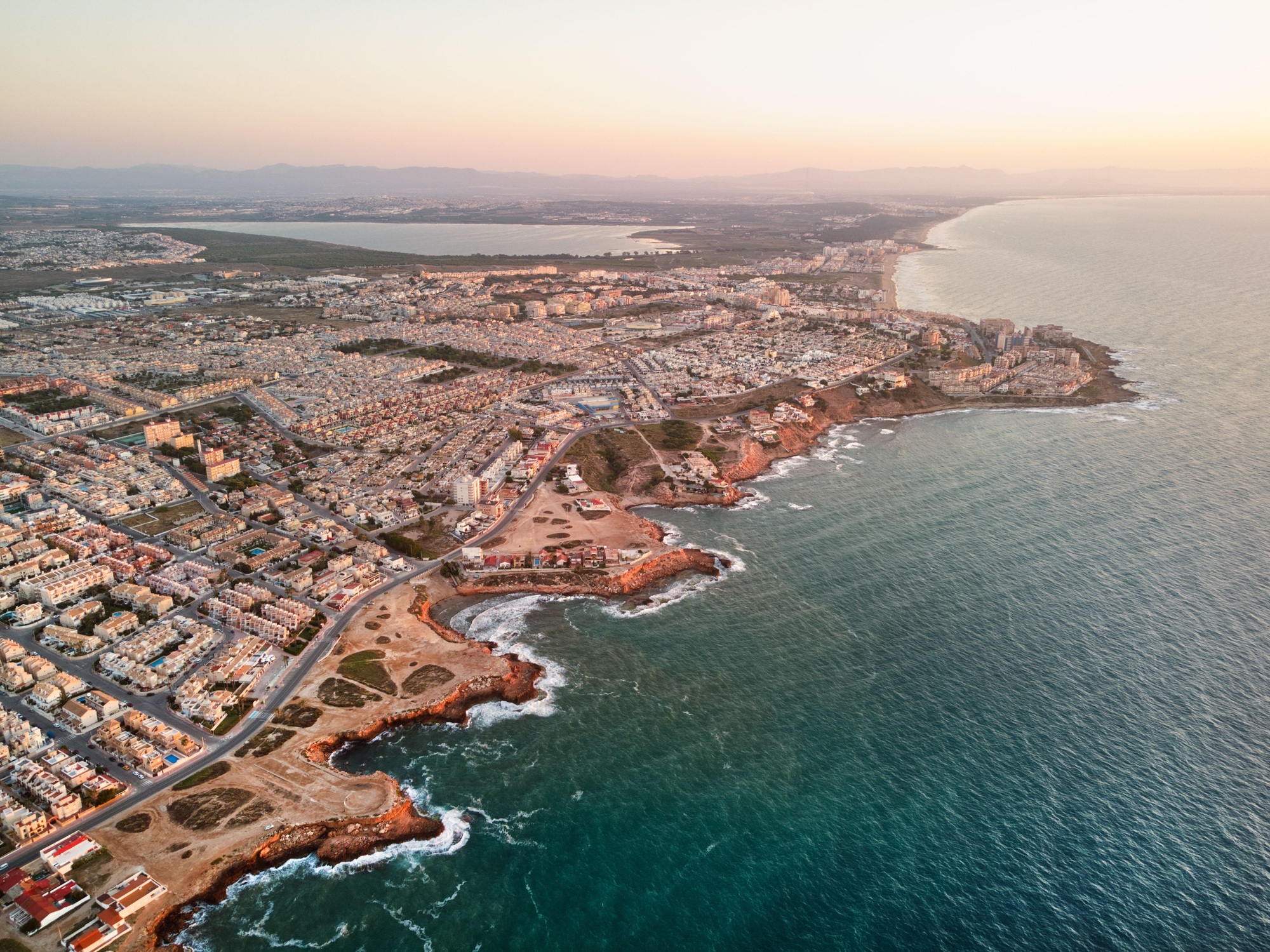 Mediterranean seascape and port harbor in Torrevieja city during sunrise